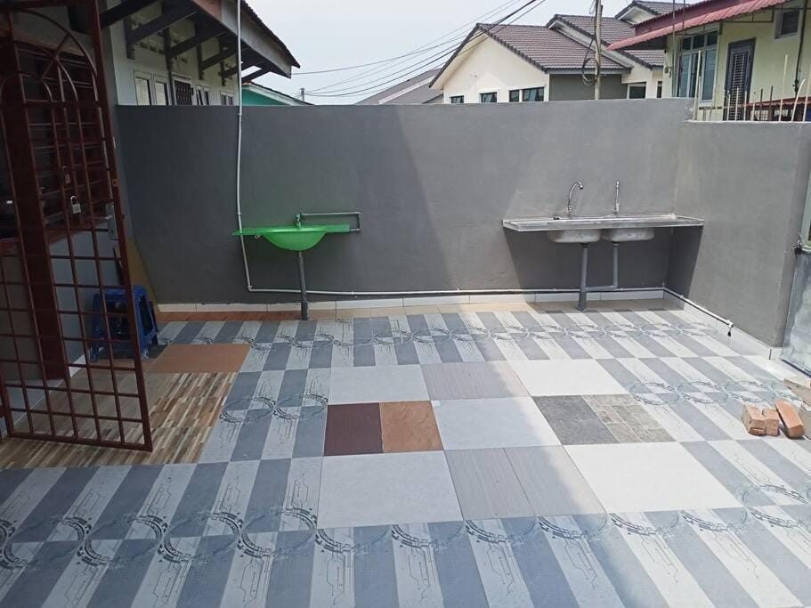 double storey cosy homestay pengkalan balak fully aircon House in Malaysia