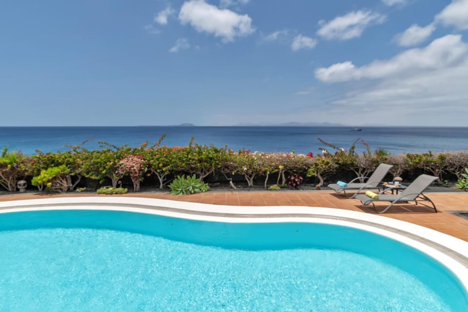 Property building, Living room, Swimming pool