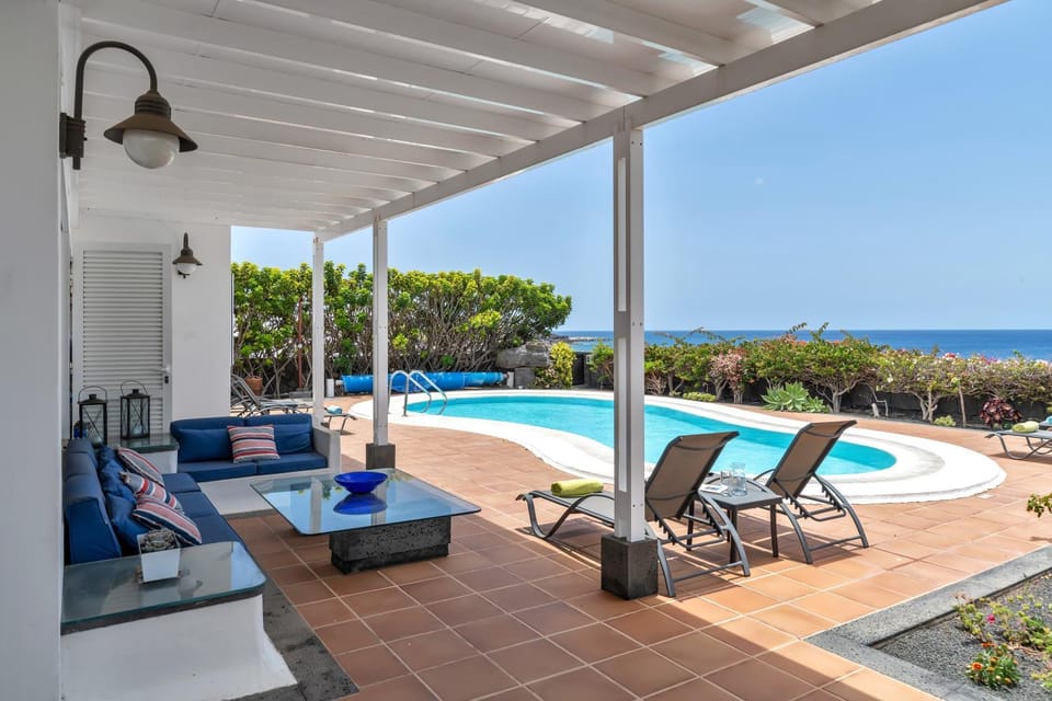 Property building, Living room, Swimming pool