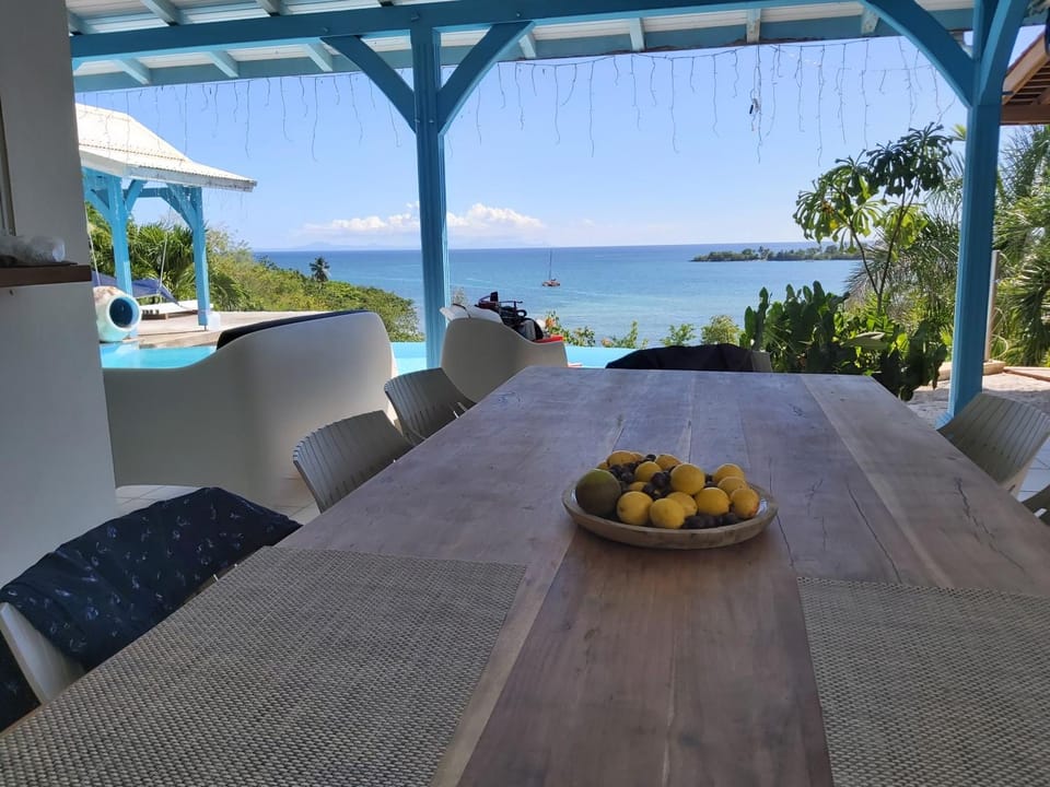 Patio, Day, Natural landscape, View (from property/room), Balcony/Terrace, Living room, Seating area, Dining area, Pool view, Sea view, Swimming pool