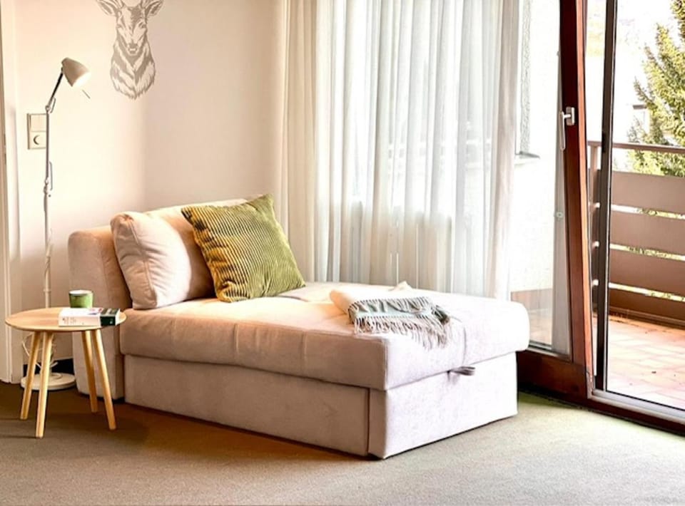 Bed, Living room, Seating area