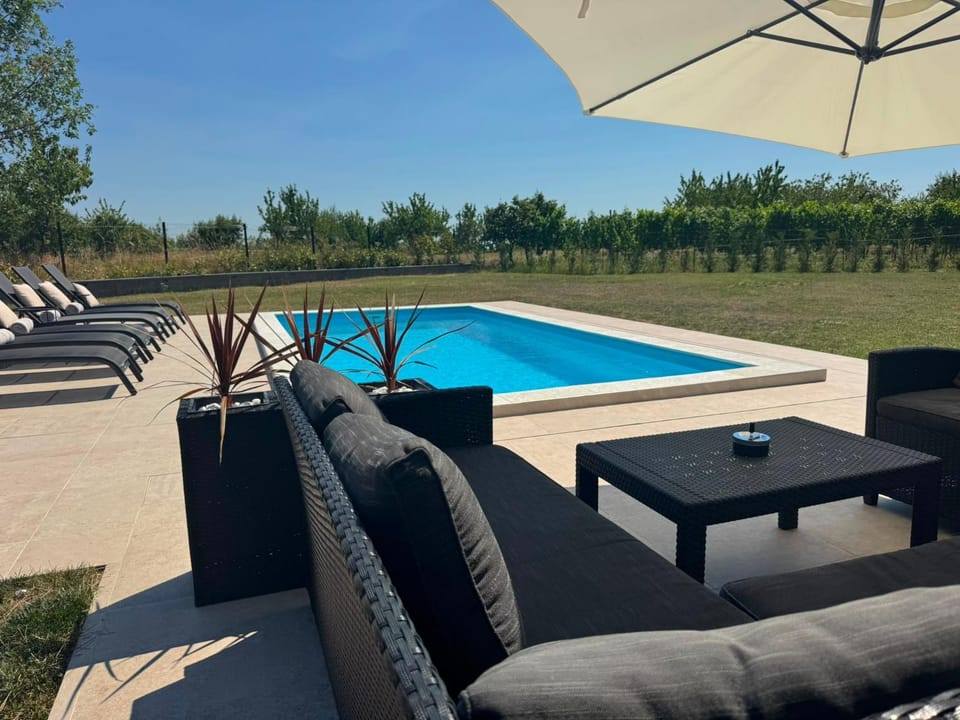 Patio, Seating area, Pool view, Swimming pool