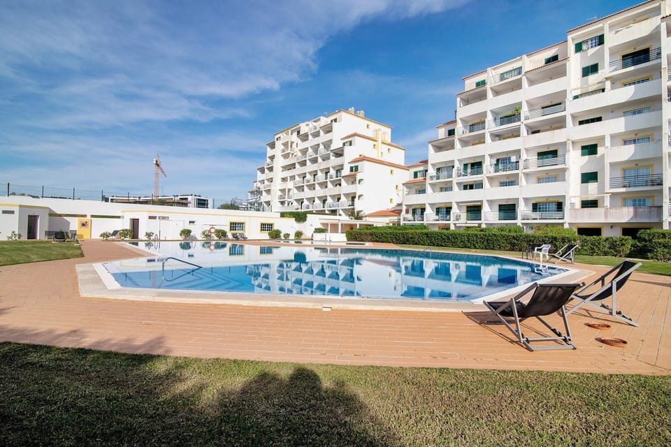 Property building, Living room, Swimming pool