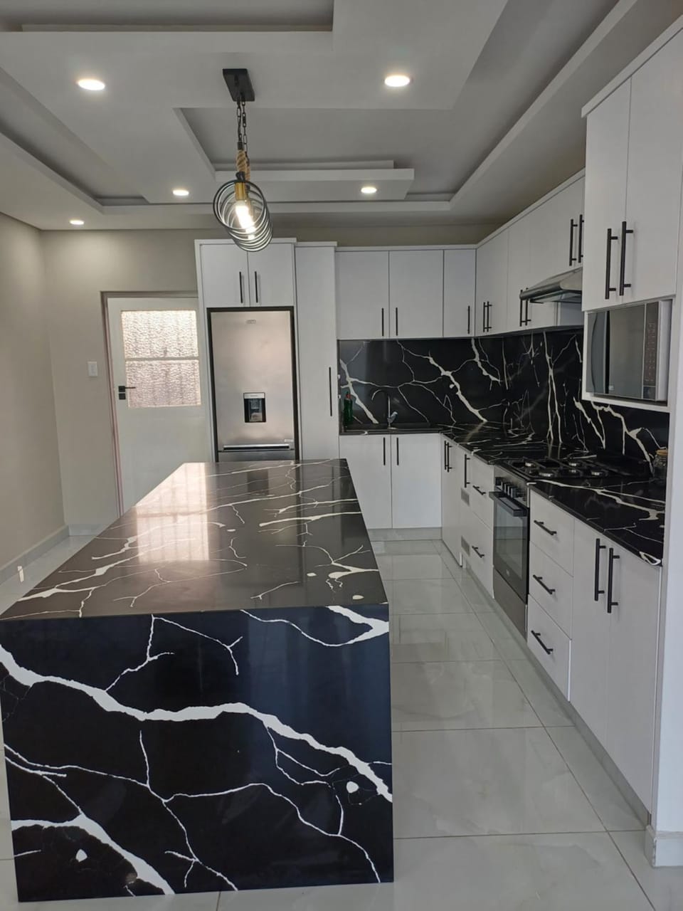 Kitchen or kitchenette, oven