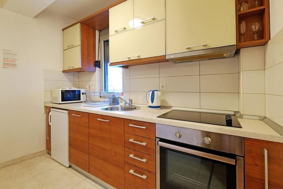 Kitchen or kitchenette, stove