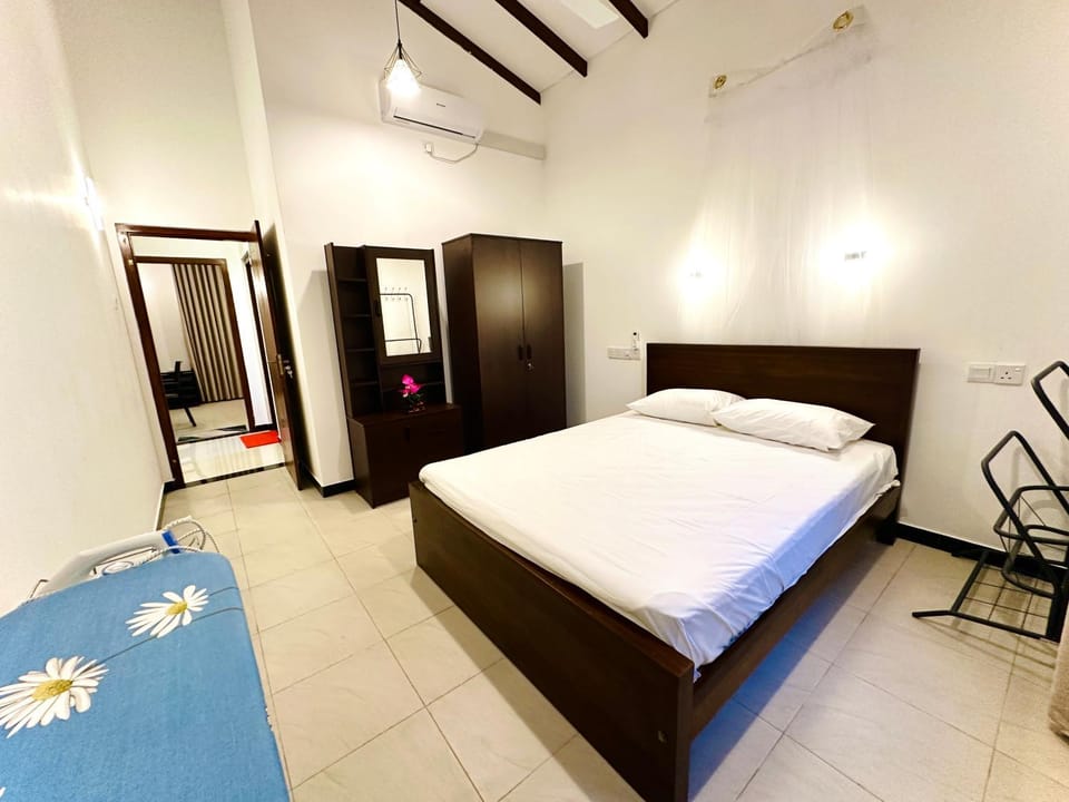 Bed, Photo of the whole room, Bedroom, fireplace, furniture, wardrobe, air conditioner