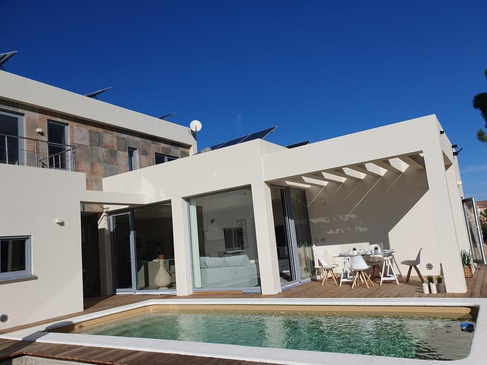 Property building, Patio, Pool view, Swimming pool