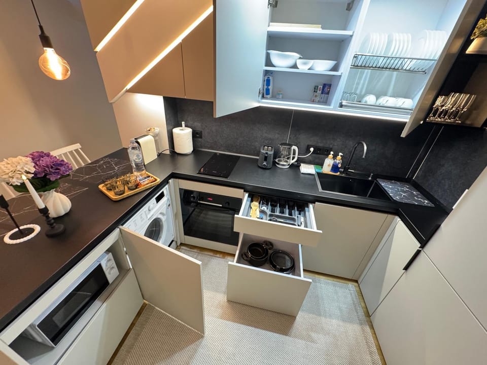 Dining area, dishwasher, oven, stove, toaster
