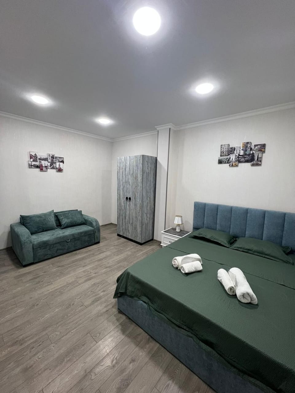Bed, Seating area, Bedroom, towels, wardrobe