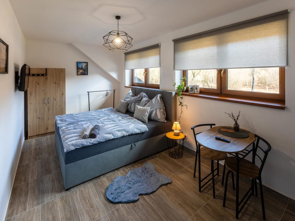 Communal lounge/ TV room, Bed, Seating area, wardrobe