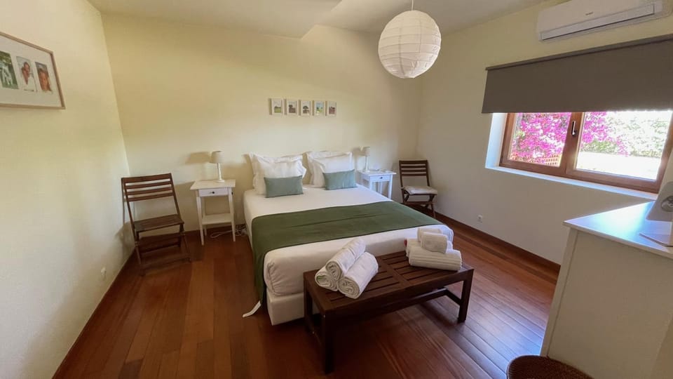 Bed, Photo of the whole room, Bedroom, towels, air conditioner