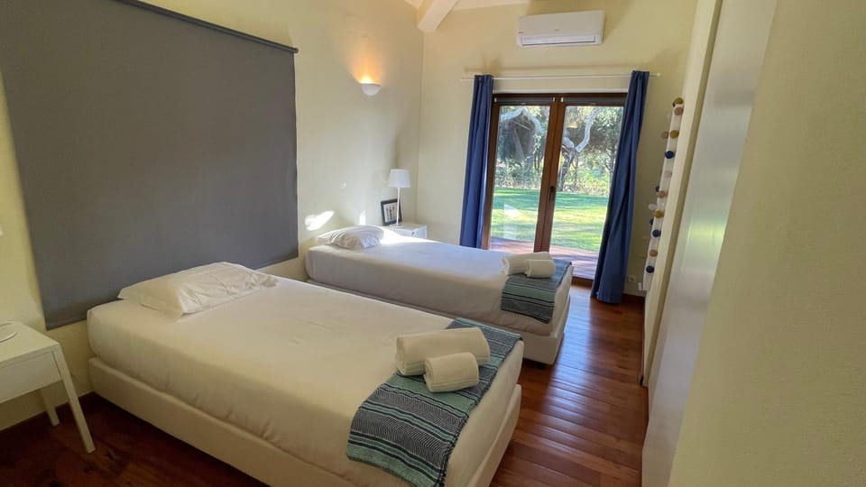 Bed, Photo of the whole room, Bedroom, towels, air conditioner