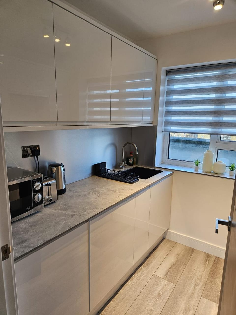 Kitchen or kitchenette, microwave, toaster