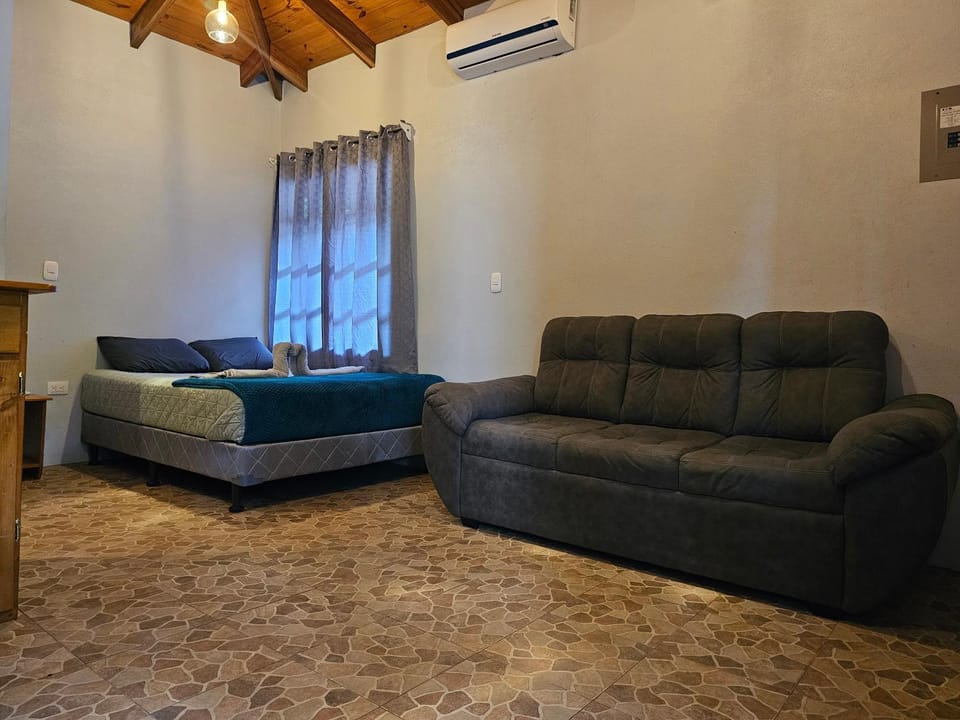 Bed, Photo of the whole room, Seating area, Bedroom, air conditioner