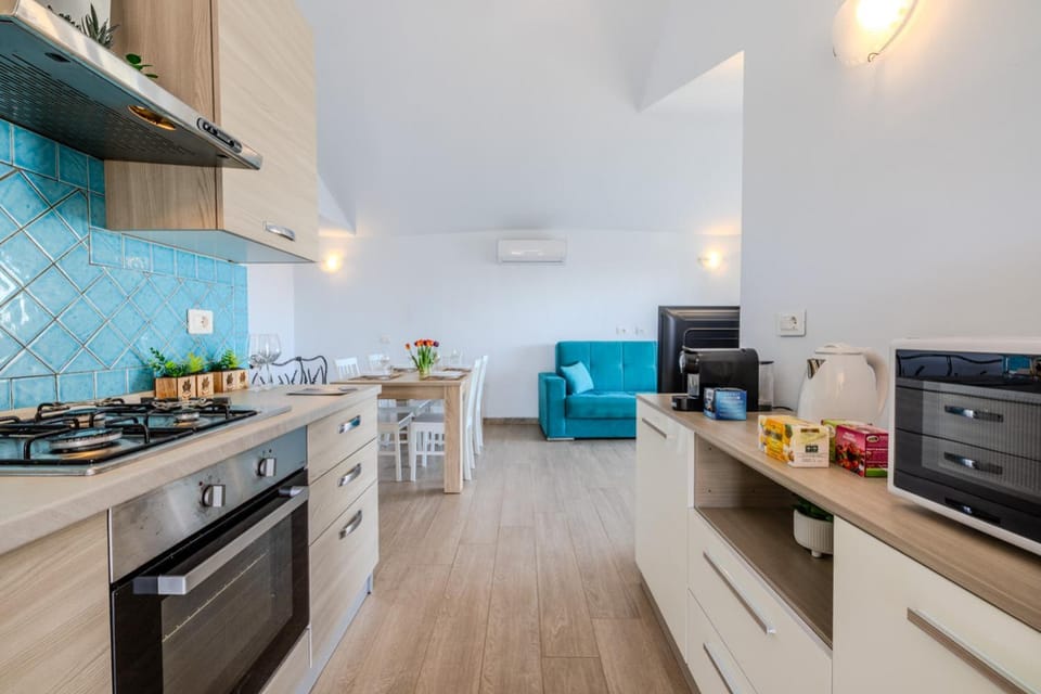 dishwasher, microwave, oven, stove, kitchen, air conditioner