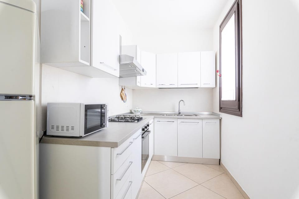 Kitchen or kitchenette, oven, stove