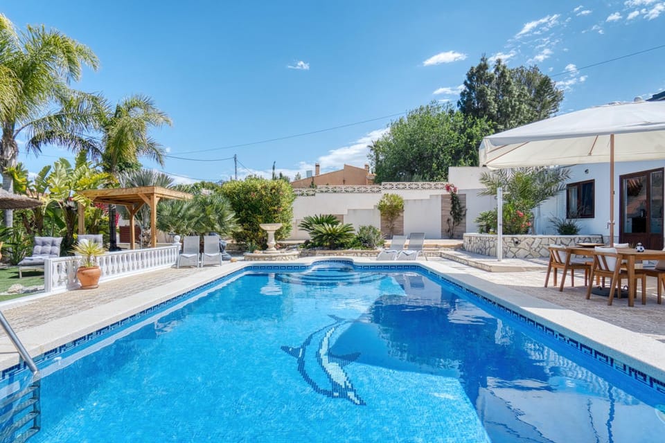 Property building, Living room, Swimming pool