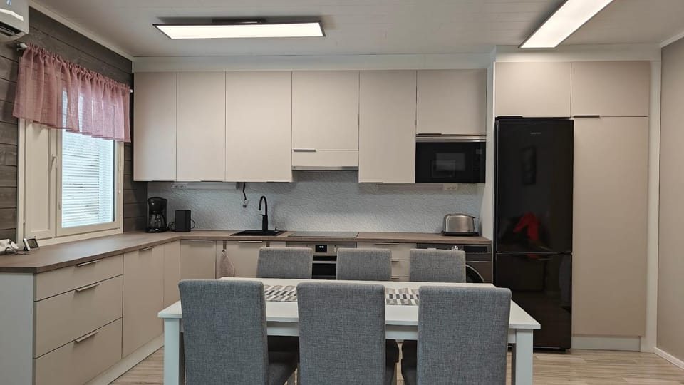 Kitchen or kitchenette, Seating area, Dining area, air conditioner
