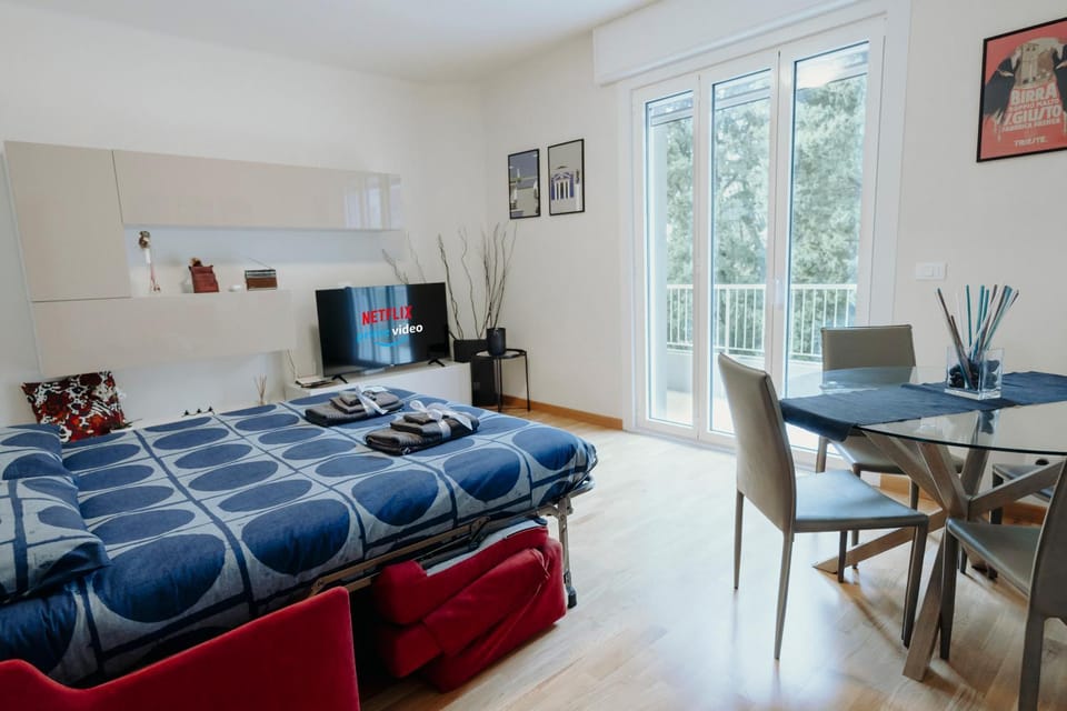 Bed, TV and multimedia, Living room, Seating area, Dining area