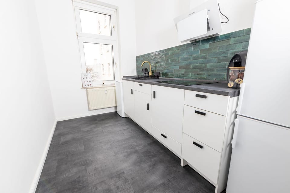 Kitchen or kitchenette, stove, washing machine