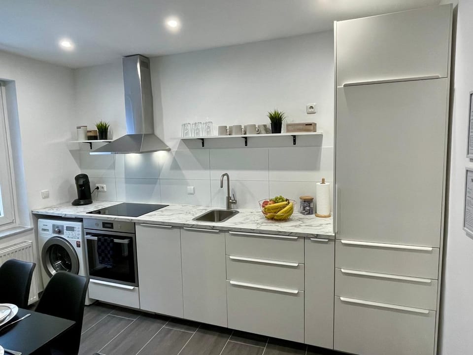 Coffee/tea facilities, dishwasher, stove, washing machine, kitchen