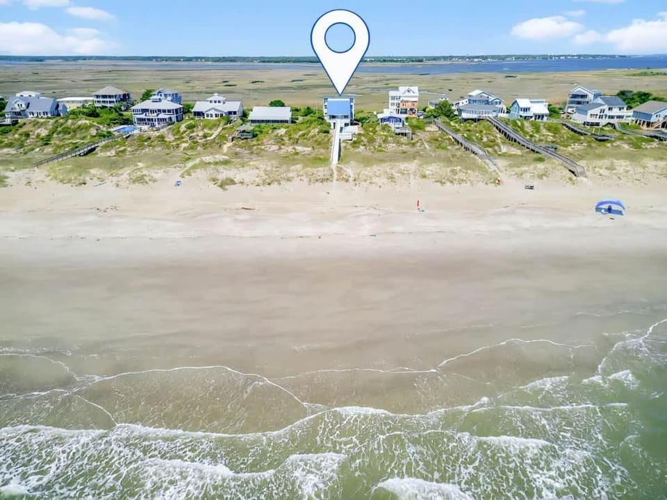 A Coconut Hut Brunswick Vacation Rentals House in Caswell Beach