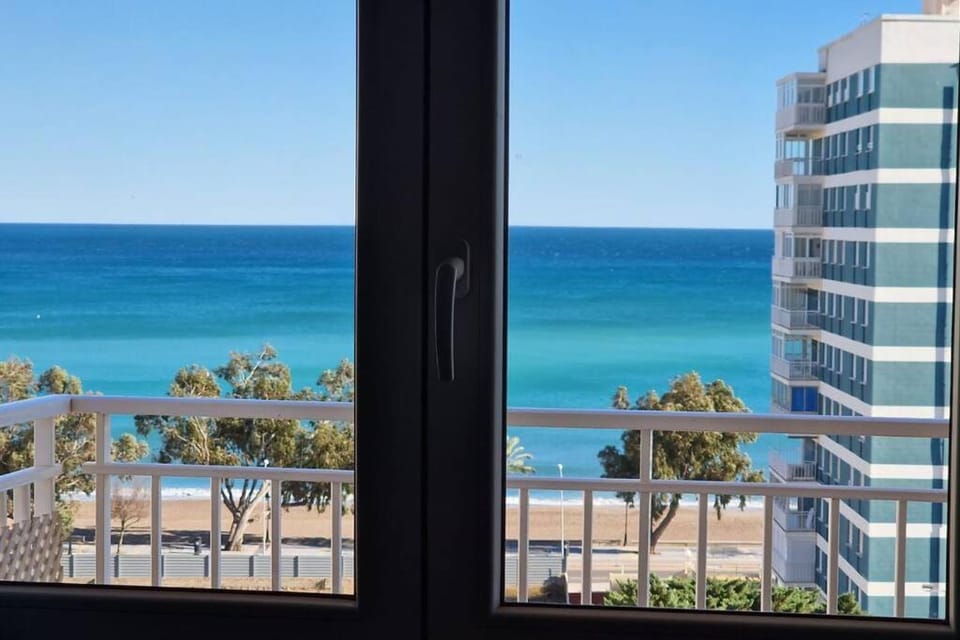 Property building, Nearby landmark, Day, Natural landscape, View (from property/room), Balcony/Terrace, Beach, City view, Sea view