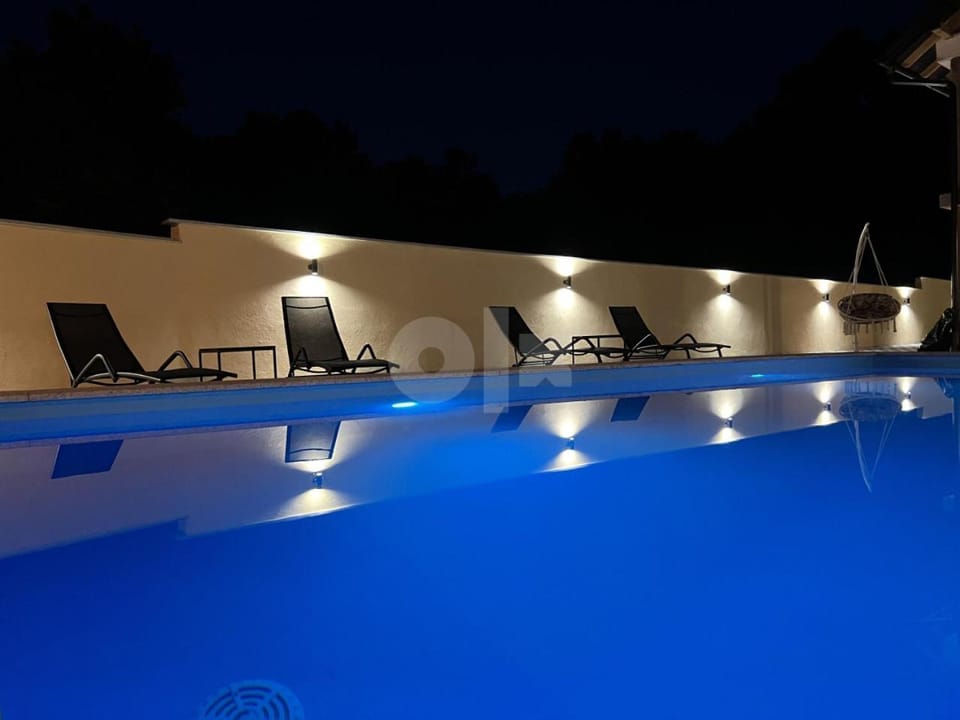 Night, Pool view, Swimming pool, sunbed