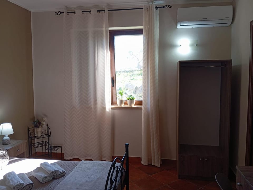 Bed, wardrobe, air conditioner