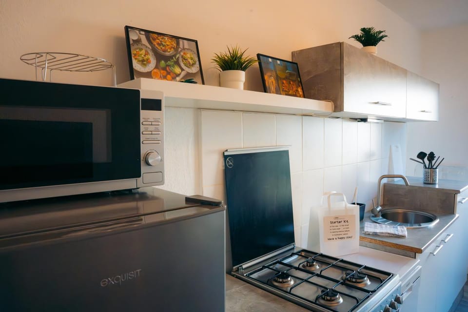 Kitchen or kitchenette, oven, stove