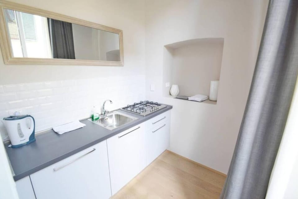 Kitchen or kitchenette, stove