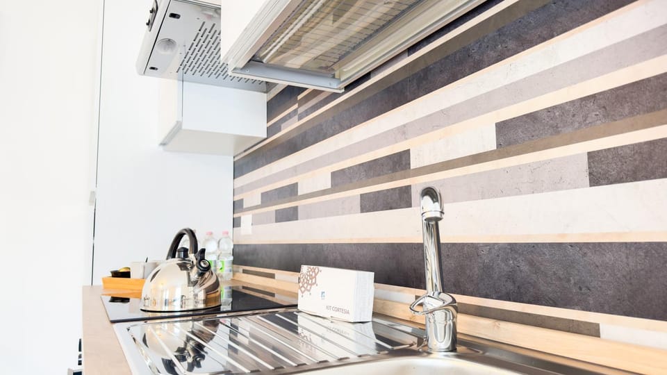 Kitchen or kitchenette, stove