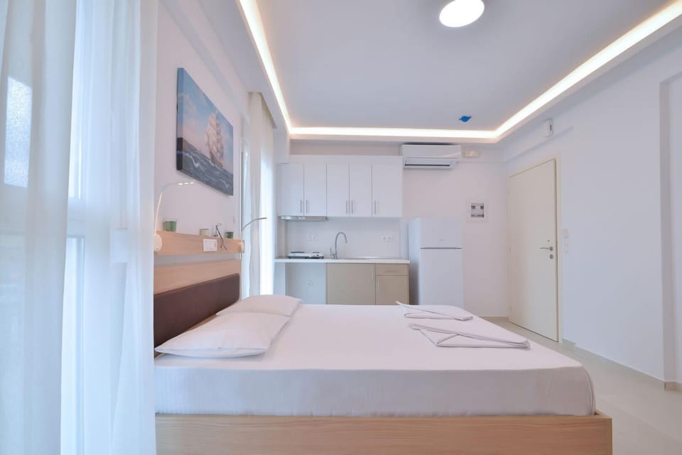 Bed, Kitchen or kitchenette, Bedroom, towels, air conditioner