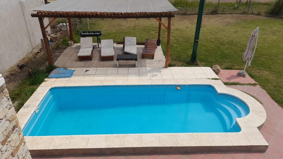 Swimming pool, sunbed