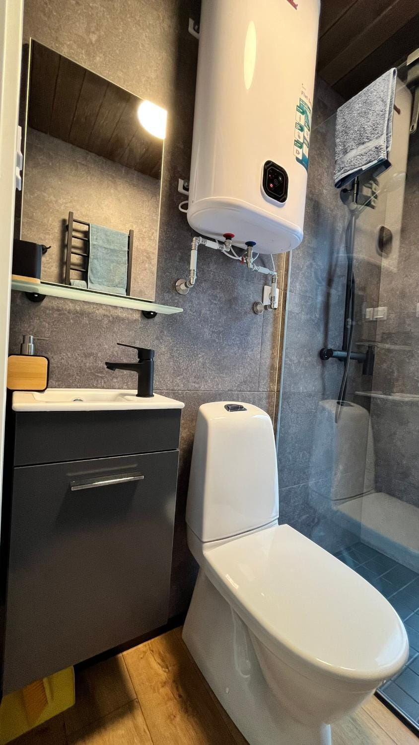 Shower, Toilet, Bathroom, hair dryier, towels