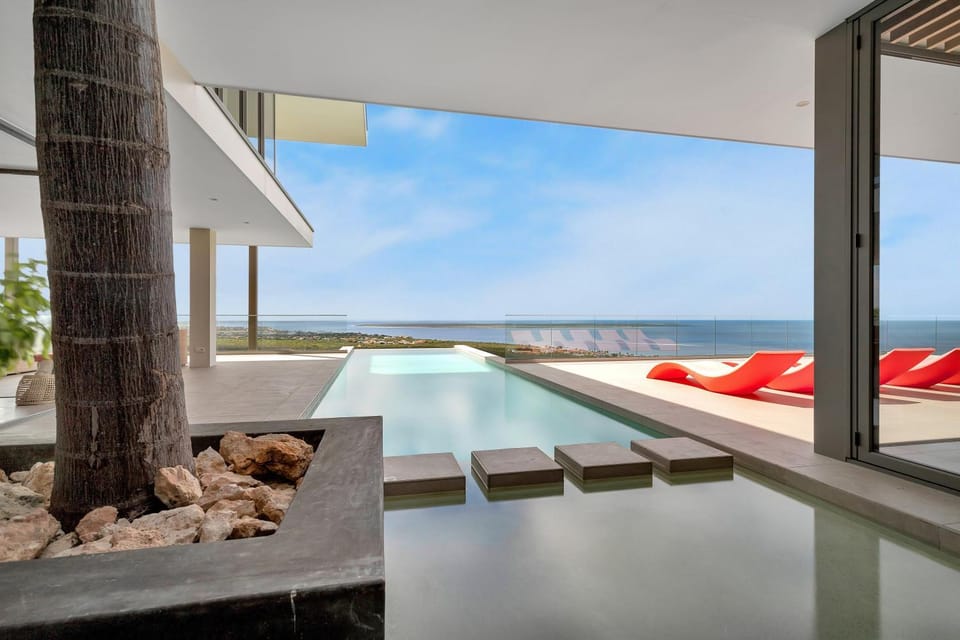Patio, Sea view, Swimming pool, sunbed