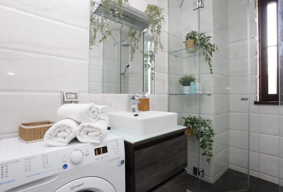 Bathroom, towels, washing machine, dryer