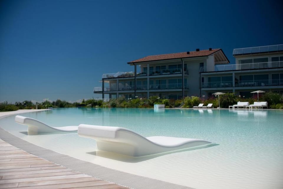 Property building, Pool view, Swimming pool, sunbed