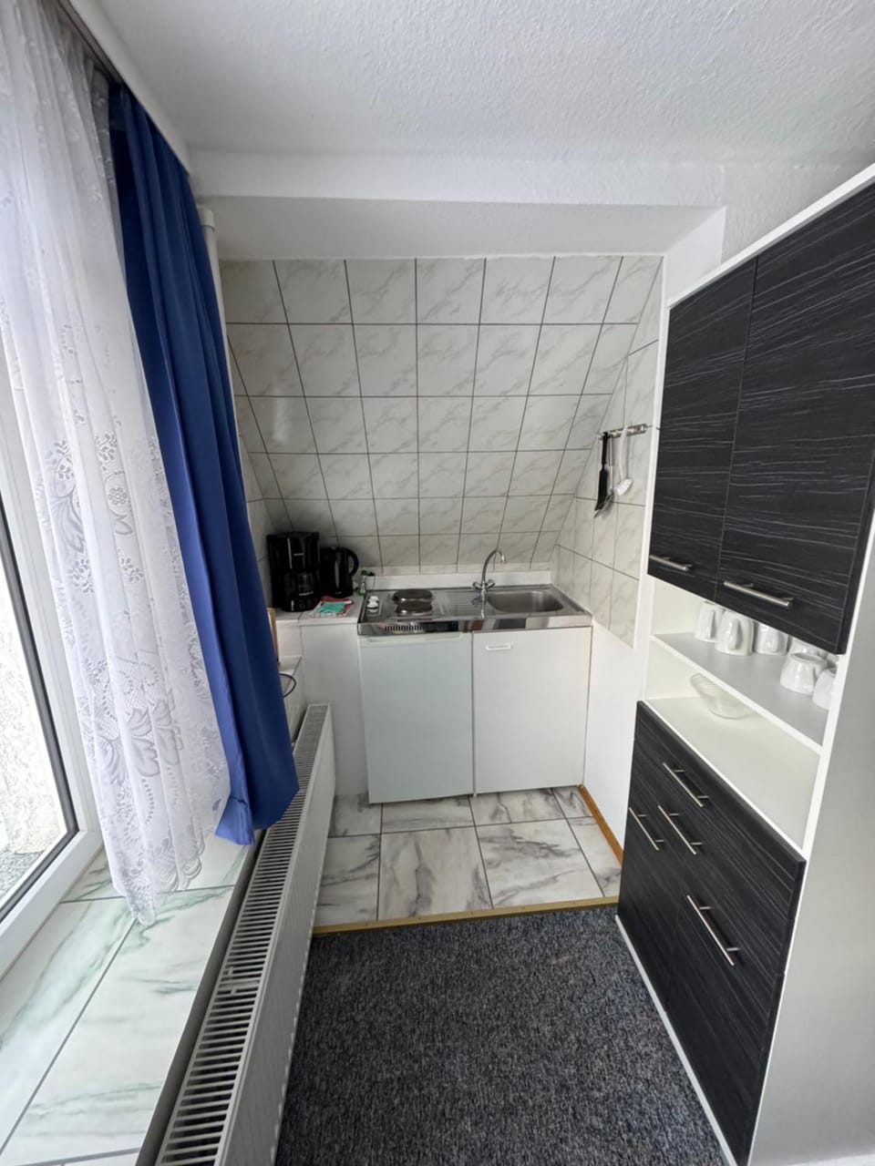 Kitchen or kitchenette, stove