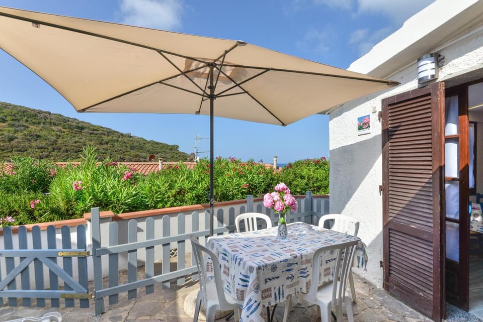 Property building, Patio, Natural landscape, Dining area