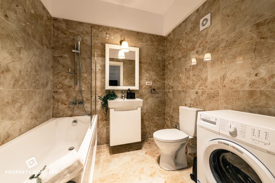 Toilet, Bathroom, towels, washing machine