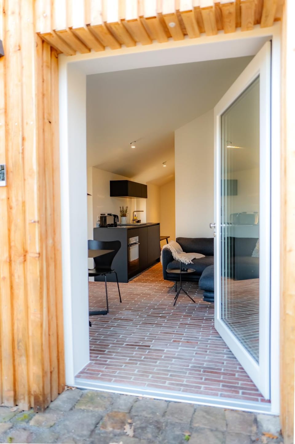 Kitchen or kitchenette, Living room, Seating area, Dining area