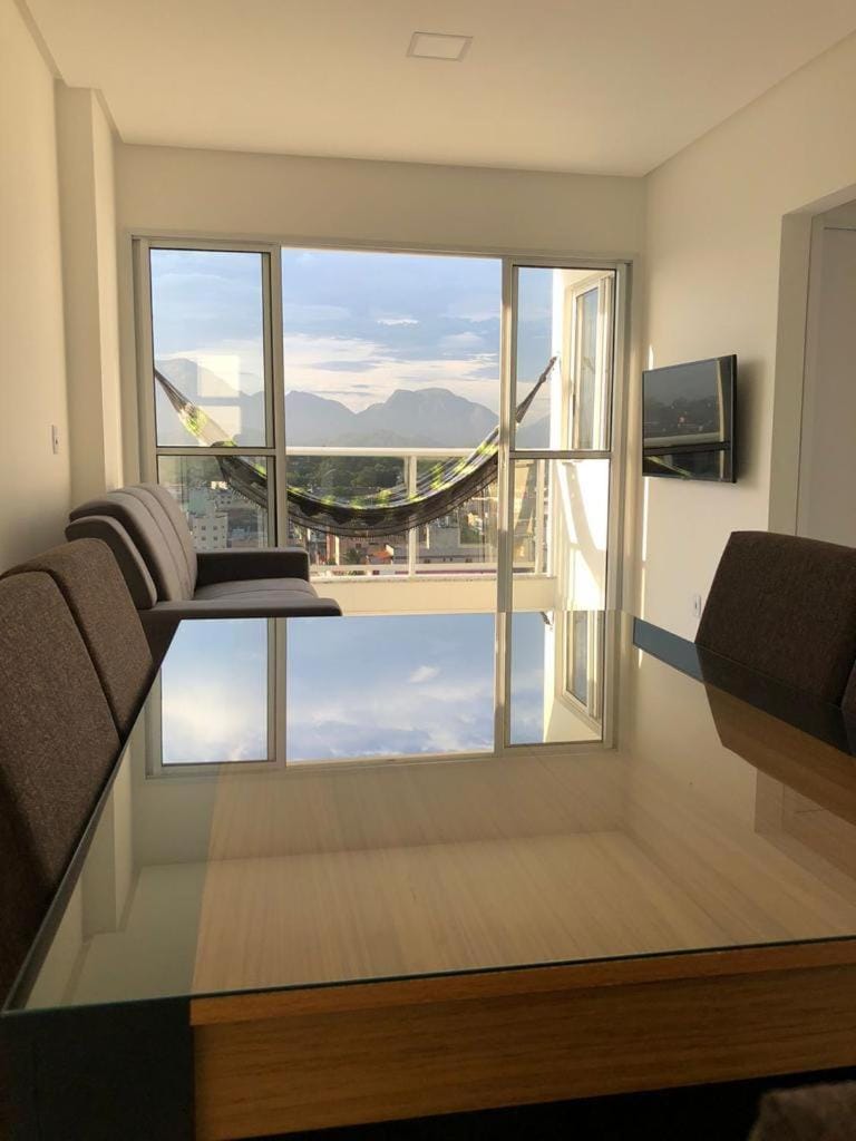 Communal lounge/ TV room, Natural landscape, TV and multimedia, Living room, Seating area, Dining area, Mountain view