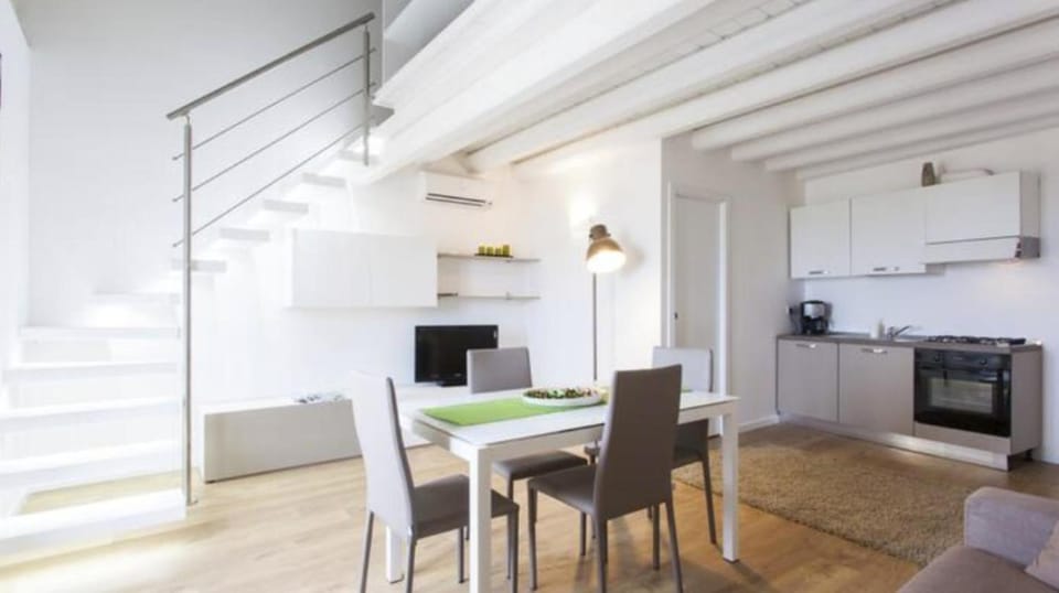 TV and multimedia, Kitchen or kitchenette, Living room, Seating area, Dining area, oven, stove, toaster