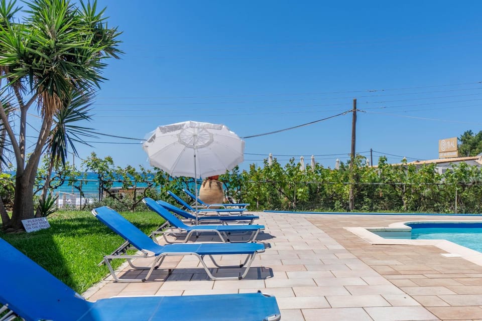 Property building, Living room, Swimming pool