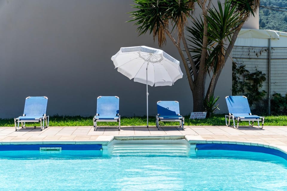 Property building, Living room, Swimming pool