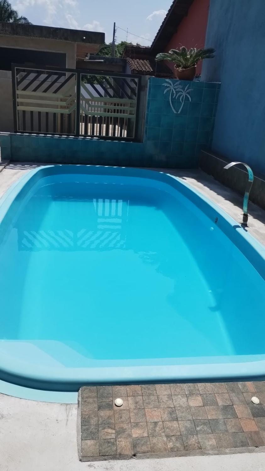 Quarto cozinha com piscina e praia perto Vacation rental in Peruíbe