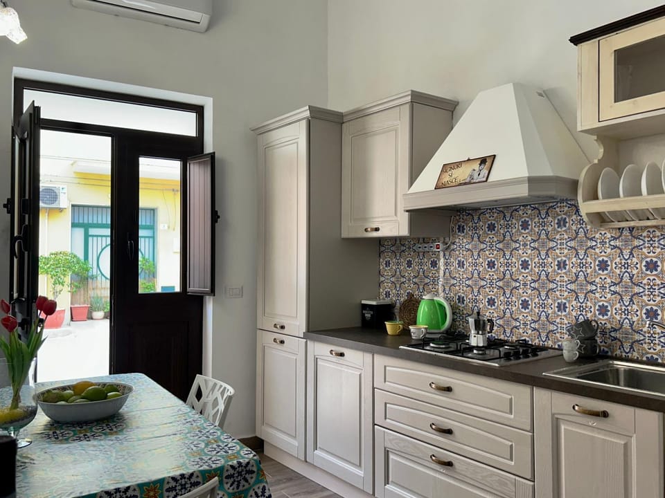 Kitchen or kitchenette, stove