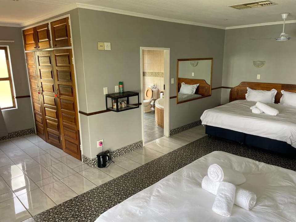 Bed, Photo of the whole room, Bedroom, fireplace, towels