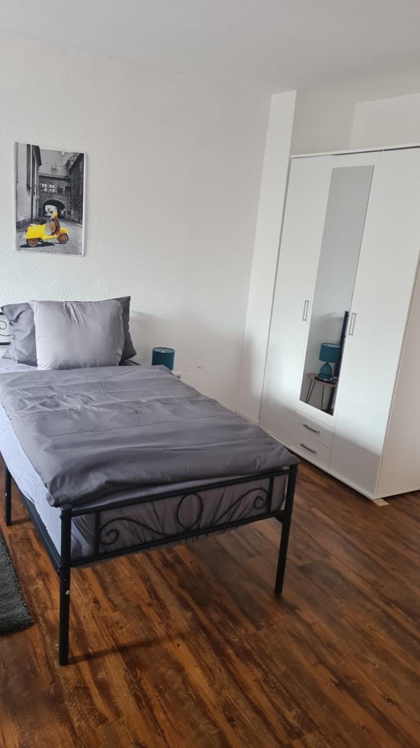 Bed, wardrobe